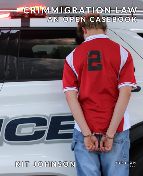 book cover of Crimmigration Law An Open Casebook showing a young man standing facing away, head against a police car, handcuffed behind his back