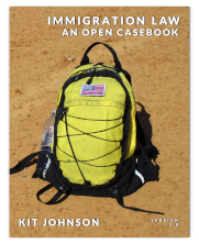 book cover of Immigration Law An Open Casebook showing yellow backpack with on dusty, bare ground